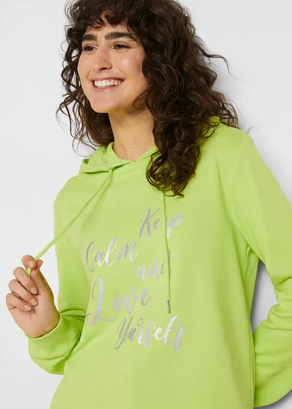 Sweat-shirt sport et féminin avec inscription métallisée, fentes latérales pour une plus grande liberté de mouvement, capuche., bonprix