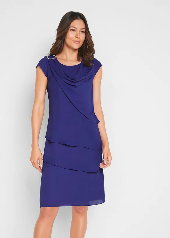 Robe courte look superposé avec accessoire sur l’épaule, bonprix