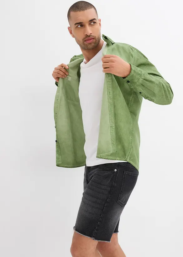 Bermuda en jean extensible à finitions effilochées, loose, bonprix
