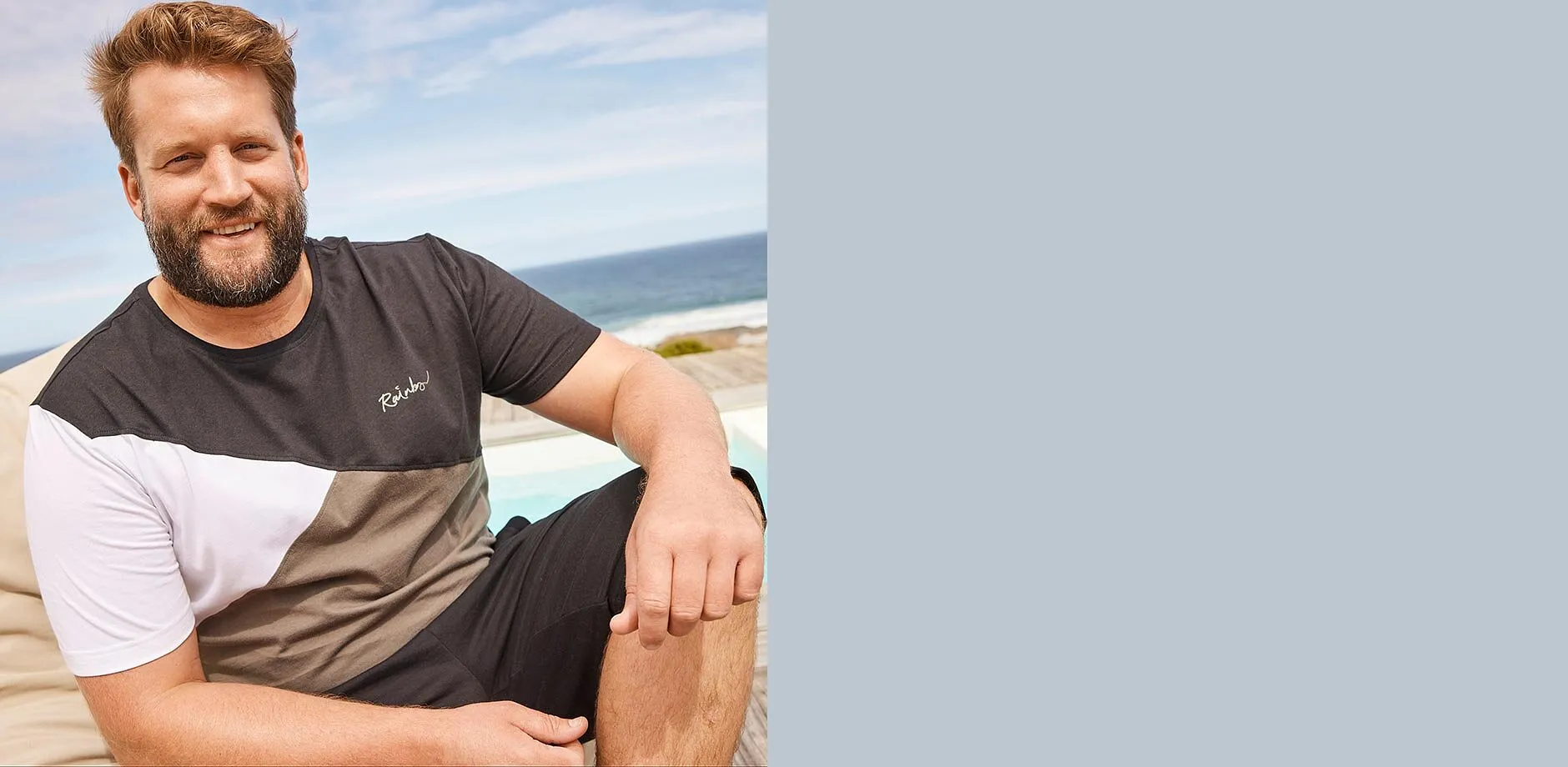 Stylisches, farblich abgesetztes T-Shirt und bequeme schwarze Shorts f&uuml;r sonnige Tage.