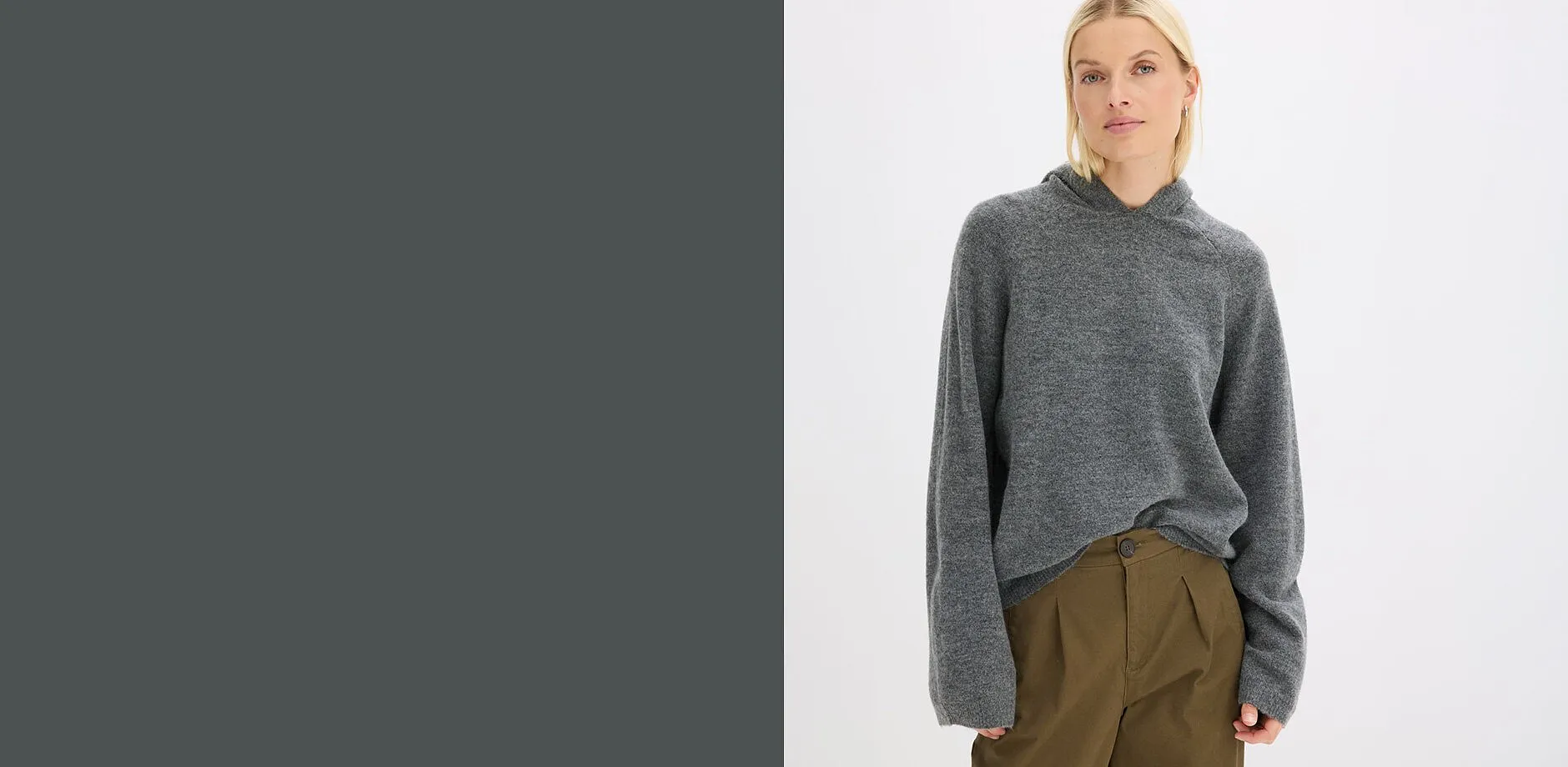 Stylischer Look mit bequemem grauem Strickhoodie und modischer olivgr&uuml;ner Bundfaltenhose.