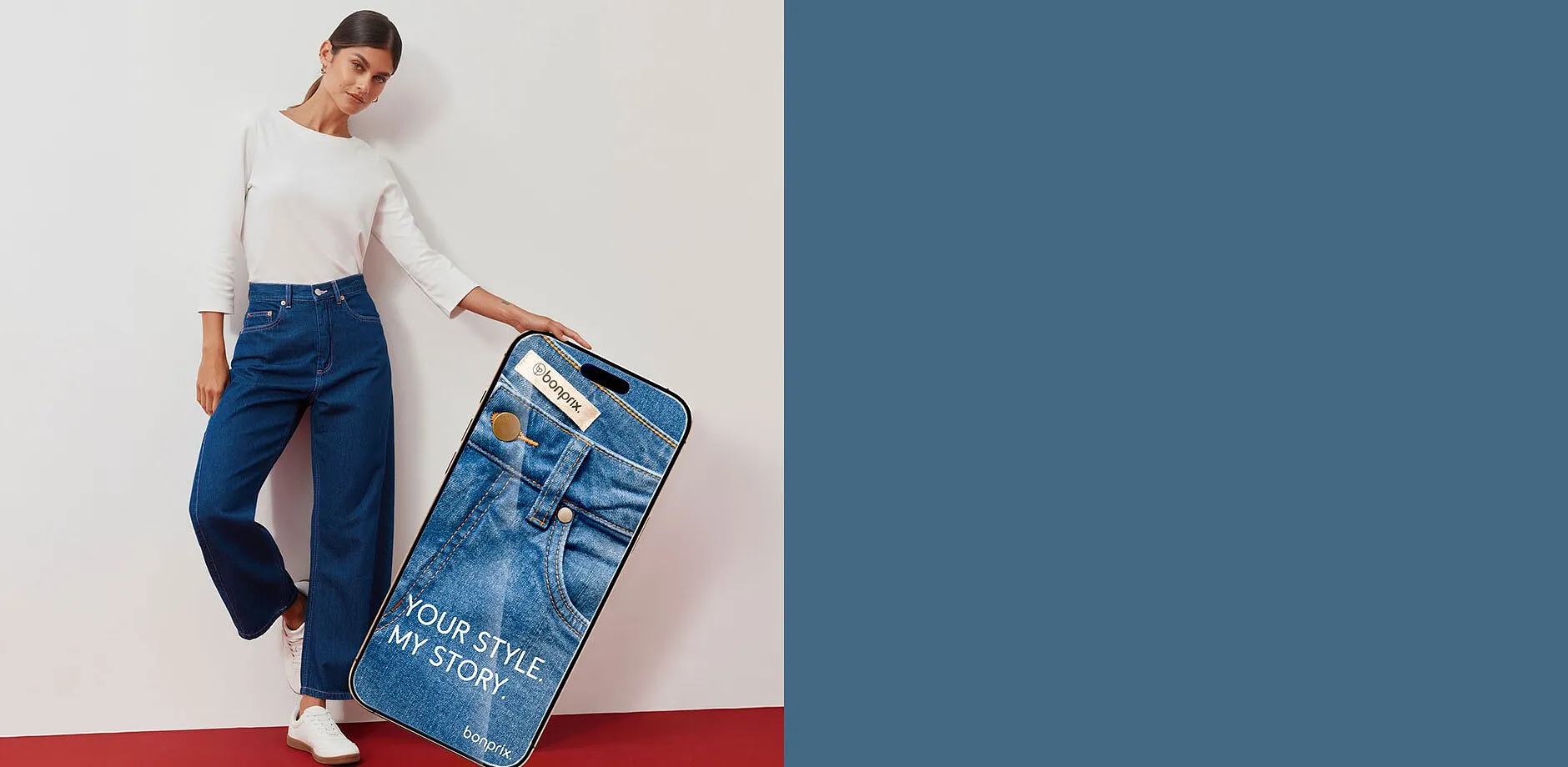 Wei&szlig;es Oberteil, modische weite Jeans und Sneaker.