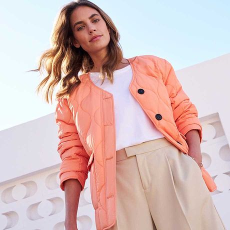 Damen - Oversize Steppjacke mit recyceltem Polyester - softorange