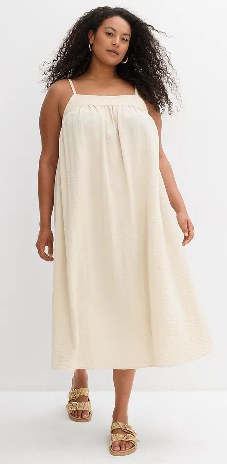 Sommerliches, cremefarbenes Trägerkleid mit lockerer Passform. 