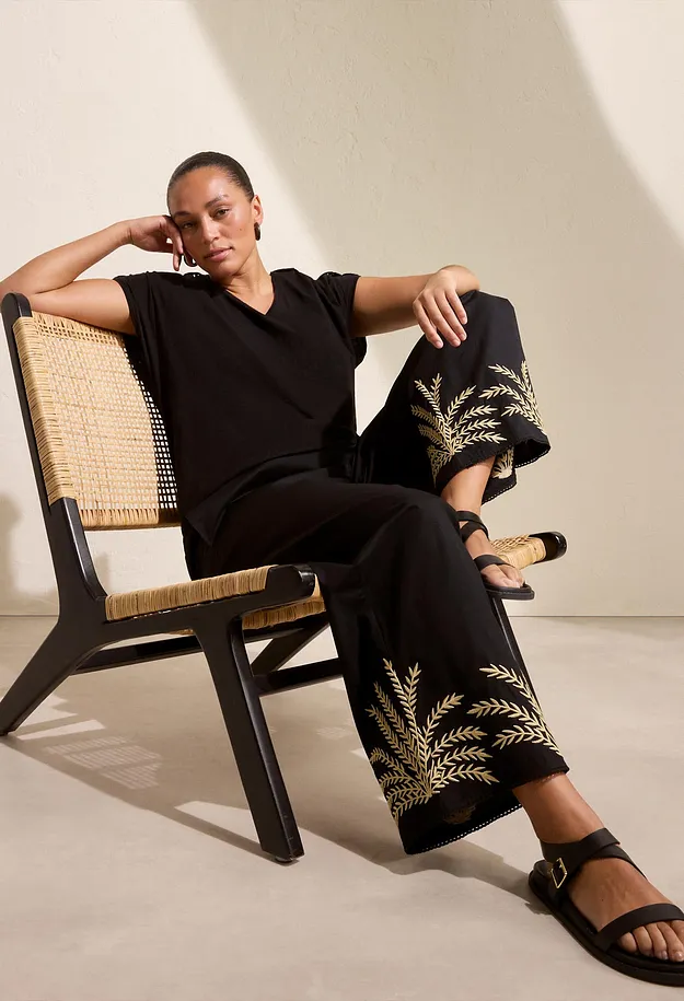 Tendance - Pantalon palazzo &agrave; broderie - noir/sable clair