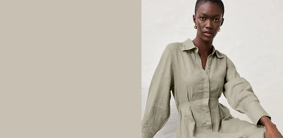 Robe-chemise manches longues élégante en lin beige pour un look casual-chic estival et aérien.