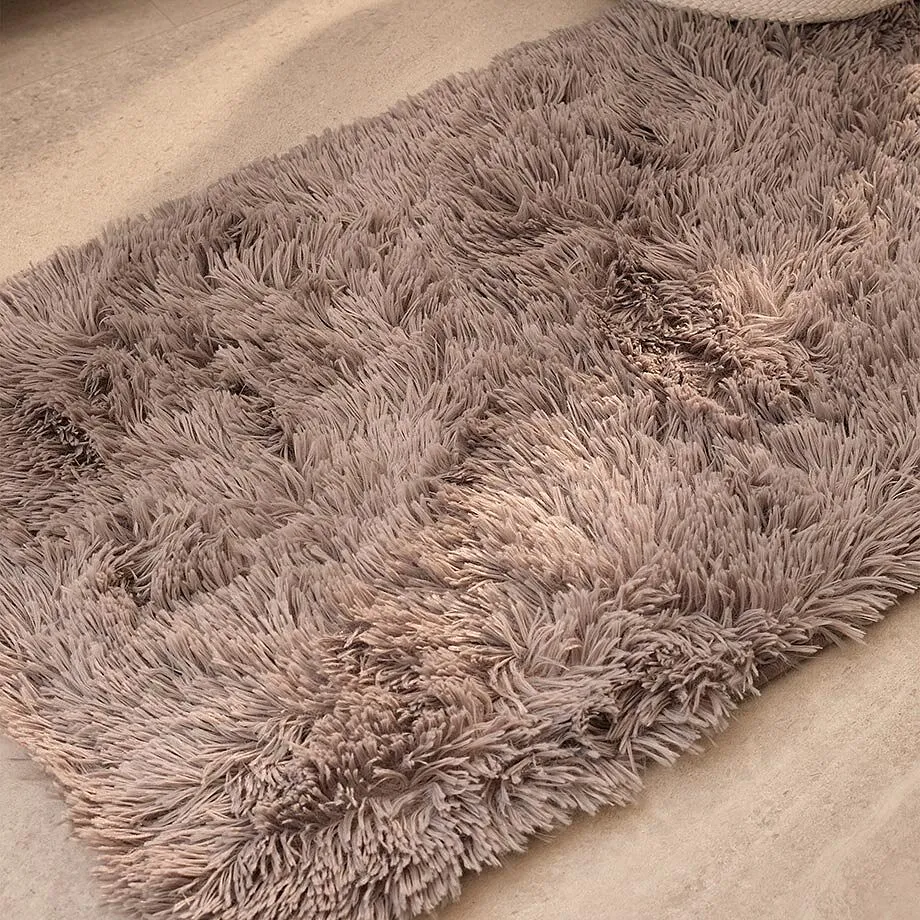 Tapis de salle de bain moelleux.