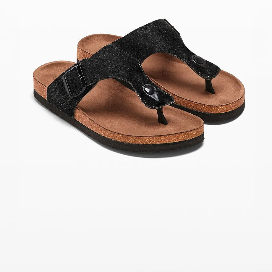 Sandales noires scintillantes avec entredoigt et bride.