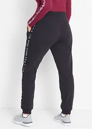 Sweathose mit Bündchen und Statement-Druck, bonprix
