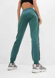 Pantalon en molleton avec lien à nouer et message imprimé, bonprix