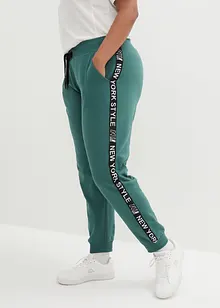 Pantalon en molleton avec lien à nouer et message imprimé, bonprix