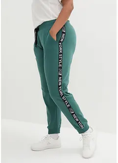 Pantalon en molleton avec lien à nouer et message imprimé, bonprix