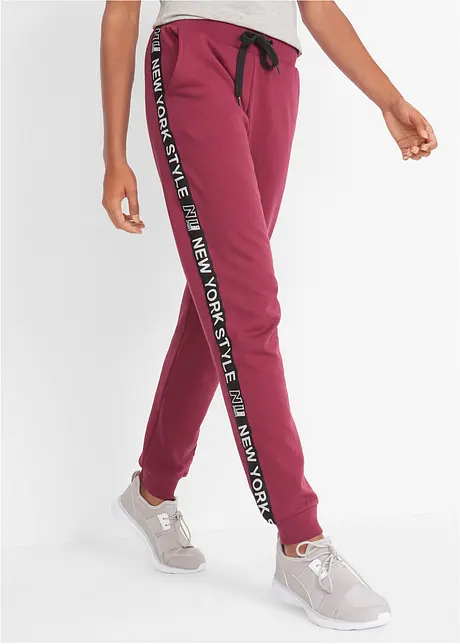 Pantalon en molleton avec lien à nouer et message imprimé, bonprix