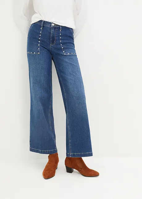 Jean taille moyenne, jambe évasée, avec rivets, bonprix