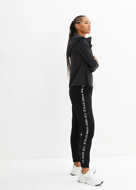 Pantalon de jogging avec finitions bord-côtes et imprimé, bonprix