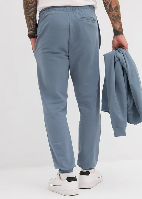 Pantalon sweat doux et élégant avec passepoil, bonprix