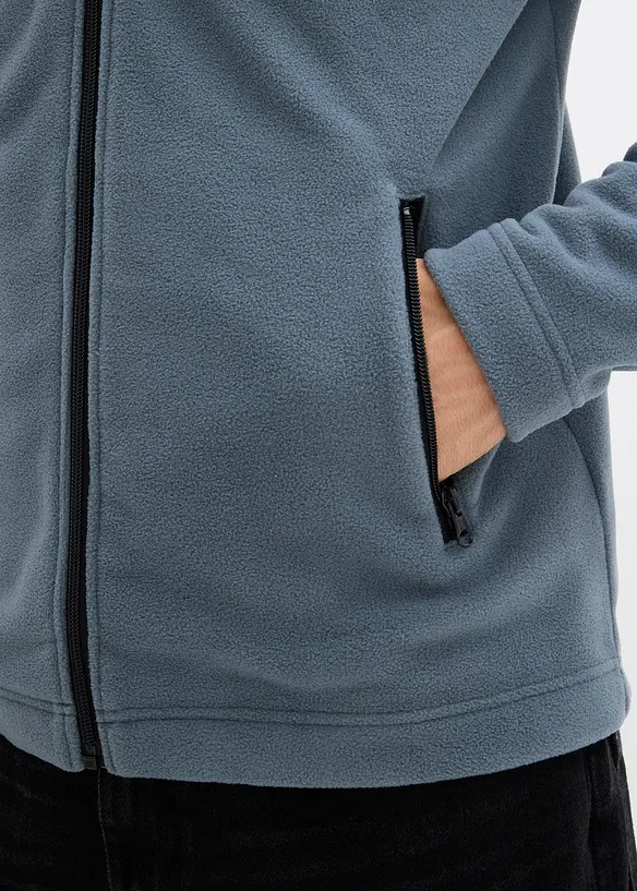 Veste polaire douce avec poches zippées pratiques, bonprix